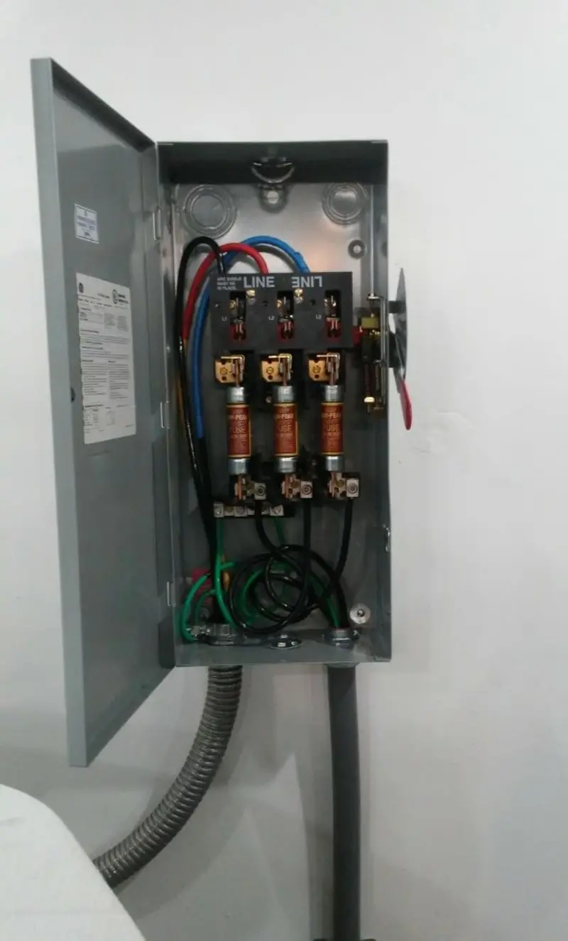 Three-phase disconnect switch installed for Smoke Detector Installation in Feather Sound